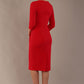 back view of the Model wearing the Makepiece tulip skirt tailored dress in scarlet red, featuring an elegant boat neckline (Scarlet Red)