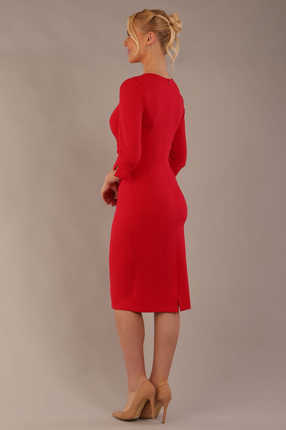 Back view of the diva catwalk Yasmeen bi-stretch dress, showing the clean tailored lines and back vent (Electric Red)