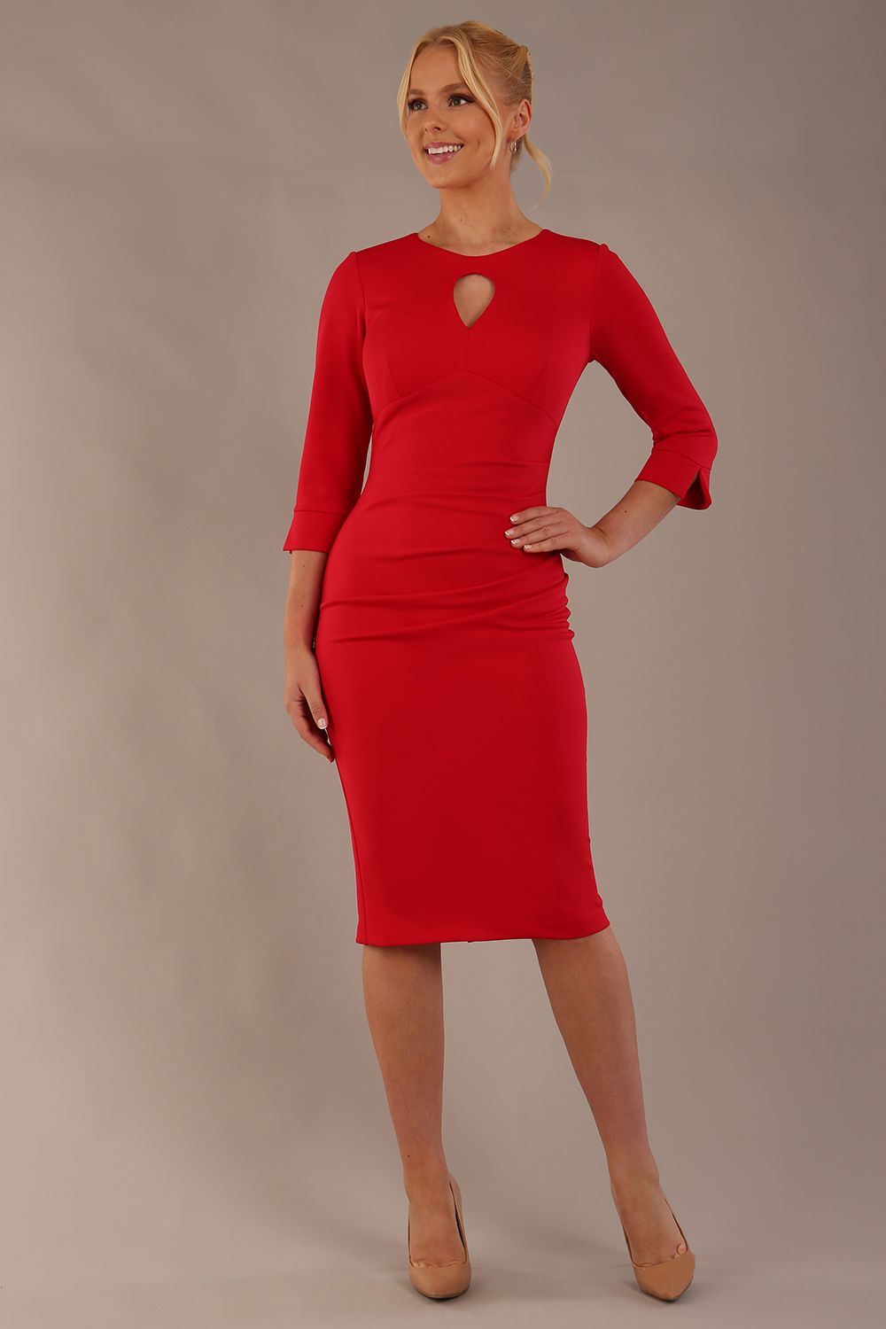 Model wearing the diva catwalk Yasmeen pencil dress in electric red, featuring a teardrop keyhole neckline (Electric Red)