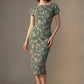 Woman wearing a diva catwalk Magritte Vintage Floral Cotton Pencil Dress, floral dress against a plain background (Vintage Floral Print)