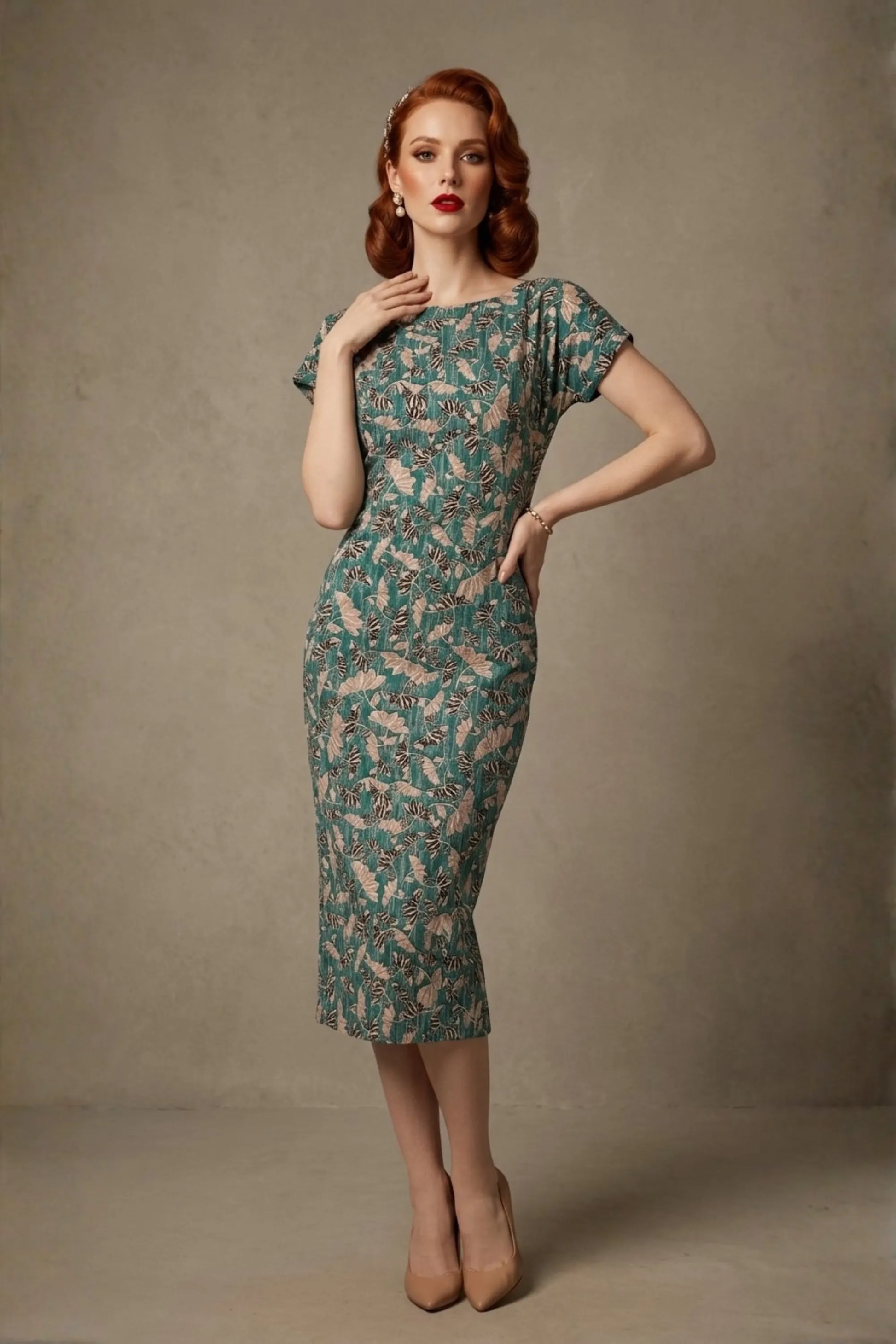 Woman wearing a diva catwalk Magritte Vintage Floral Cotton Pencil Dress, floral dress against a plain background (Vintage Floral Print)