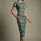 Woman wearing a diva catwalk Magritte Vintage Floral Cotton Pencil Dress, floral dress against a plain background (Vintage Floral Print)