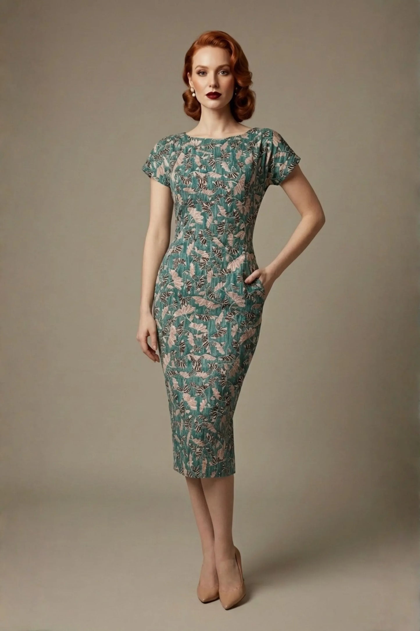 Woman wearing a diva catwalk Magritte Vintage Floral Cotton Pencil Dress, floral dress against a plain background (Vintage Floral Print)
