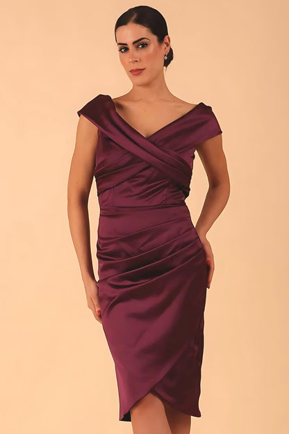 model is wearing diva catwalk casa blanca satin burgundy pencil dress off shoulder design front