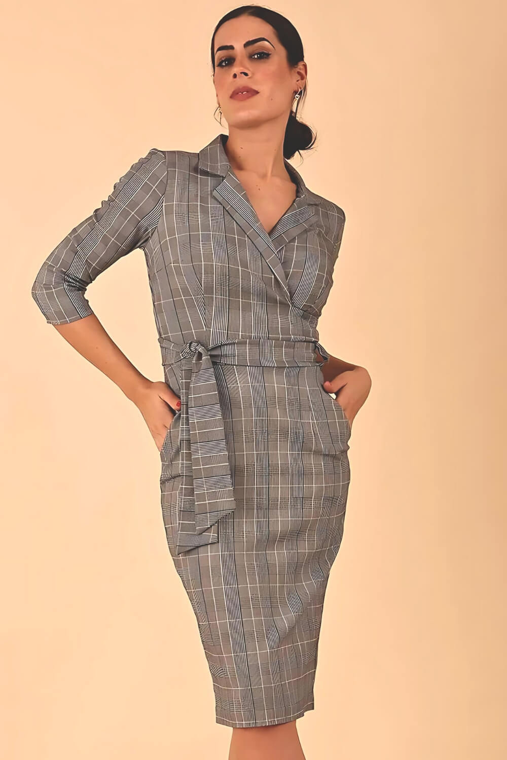 Model wearing the Diva Colette Check dress with collar detail and three quarter length sleeve in Prince of Wales check front image