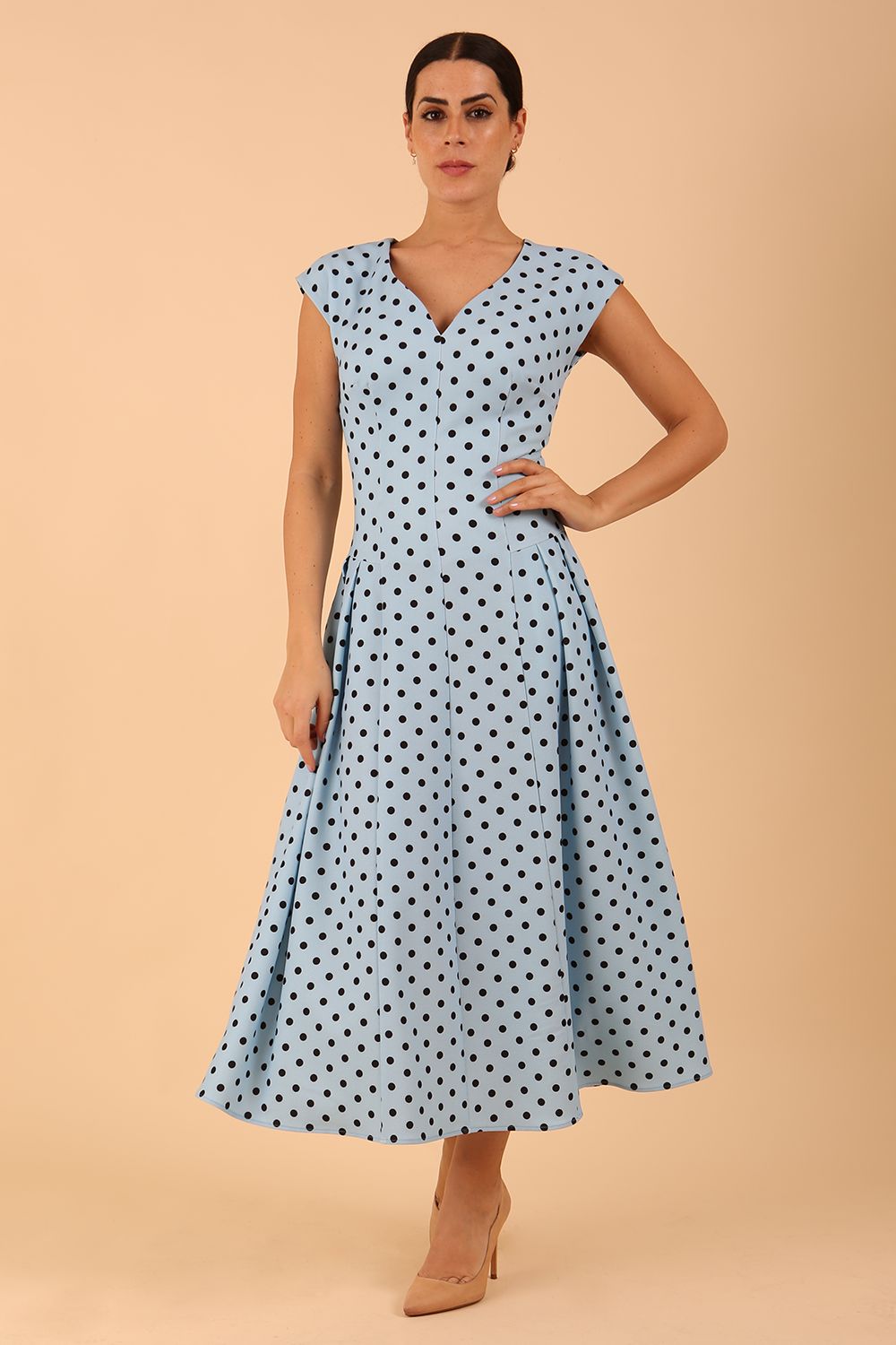 Audrey Polka Dot Print Sleeveless Swing Dress With Pockets in sky blue colour