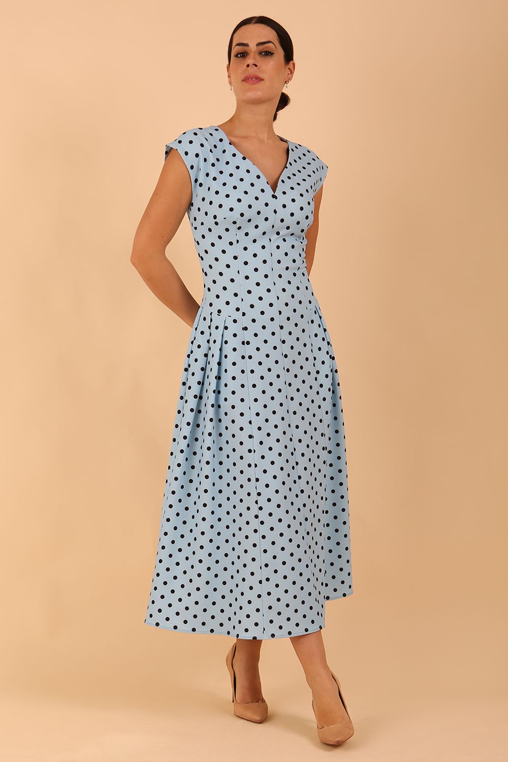 Audrey Polka Dot Print Sleeveless Swing Dress With Pockets in sky blue colour