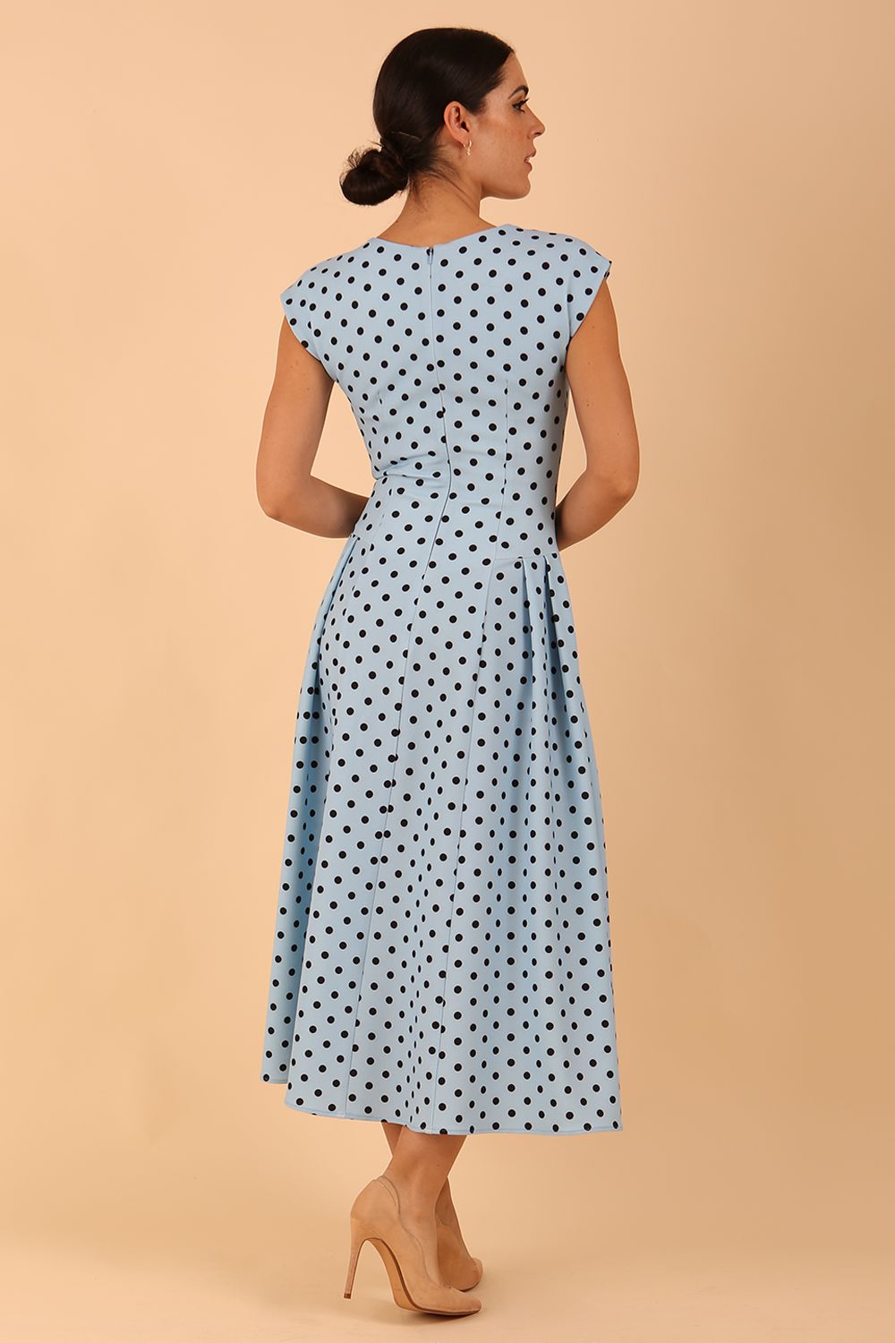 Audrey Polka Dot Print Sleeveless Swing Dress With Pockets in sky blue colour