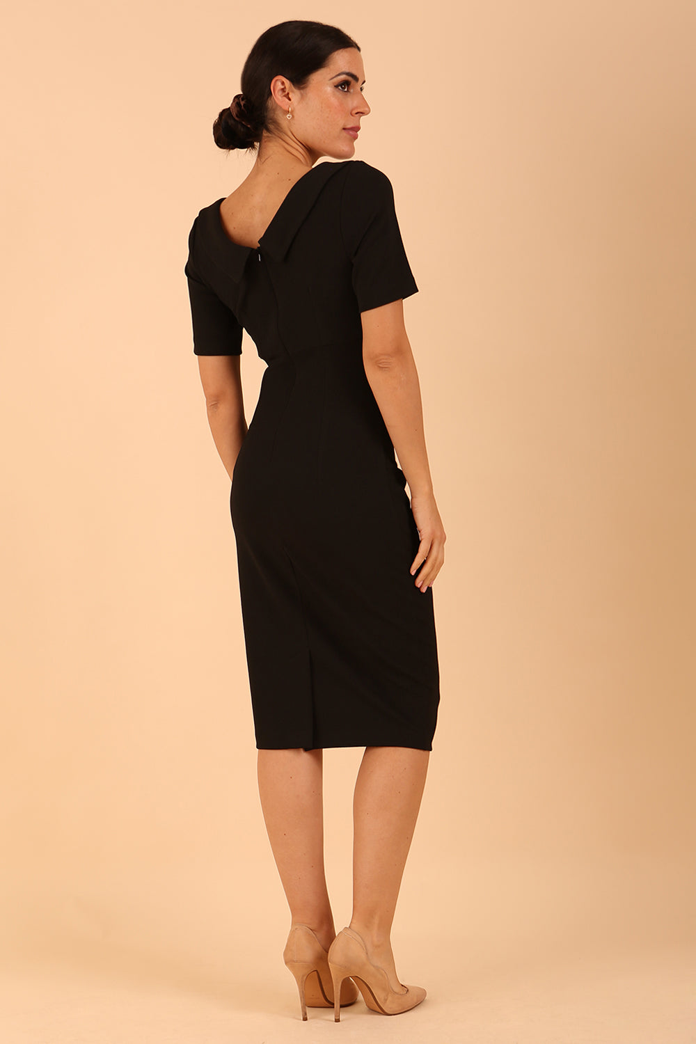 model is wearing diva catwalk camille short sleeve pencil dress with folded rounded neckline in black back