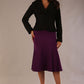 Model wearing a purple Marlene fishtail skirt, highlighting the silhouette with an elegant DIVA black jacket