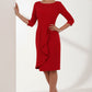 model is wearing diva catwalk jacky dress with rounded neckline 3/4 sleeve and bow detail on the waist in scarlet red front view (Scarlet Red)