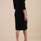Model wearing diva catwalk Luna 3/4 Sleeved pencil skirt dress in Black