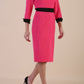 Model wearing diva catwalk Reese 3/4 Sleeved pencil skirt dress with a contrast sleeve and waistband details in Fuschia Pink/Black