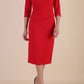 model wearing diva catwalk ubrique pencil dress with a keyhole detail and sleeves in scarlet red
