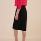 brunette model wearing diva catwalk pink sleeved bolero over a printed pencil dress front
