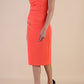  model wearing diva catwalk primula pencil skirt dress in pink with pleating on one side and sleeveless design in colour Hot Coral