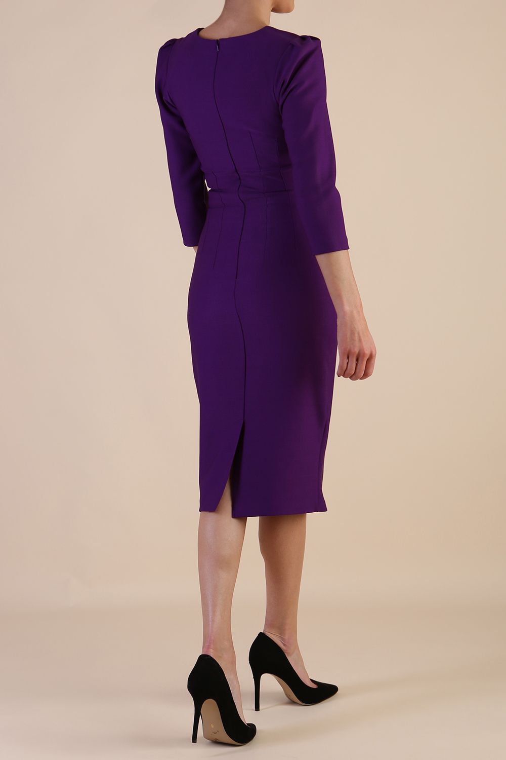 model is wearing diva catwalk seed fitzrovia sleeved pencil dress in imperial purple front