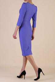 model is wearing diva catwalk seed fitzrovia sleeved pencil dress in dawn indigo front