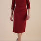model is wearing the Diva Catwalk Ubrique pencil dress with Long sleeves and keyhole detail in Wine fabric colour
