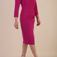 model is wearing diva catwalk miracle pencil dress with keyhole detail on a side of the front panel and gathering detail on a side or bodice panel with sleeves in magenta haze colour front