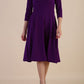 model is wearing diva catwalk january sleeved a-line v-neck dress in deep purple front