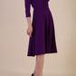 model is wearing diva catwalk january 3/4 sleeves a-line v-neck swing dress in deep purple front side