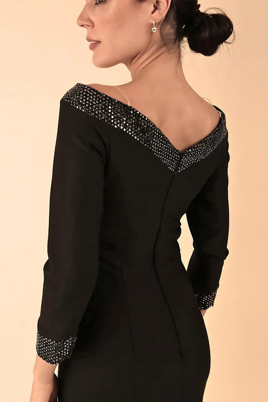 Model wearing a diva catwalk ToTo Bardot Neckline Off Shoulder Pencil Dress in Black colour Back Image