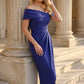 model wearing diva catwalk vegas calf length spectrum indigo midaxi dress with wide bardot neckline and open shoulders with a large opening at the front of the skirt with pleating coming down long skirt front (Spectrum Indigo)