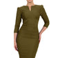 model is wearing diva catwalk seed fitzrovia sleeved pencil dress in olive green front
