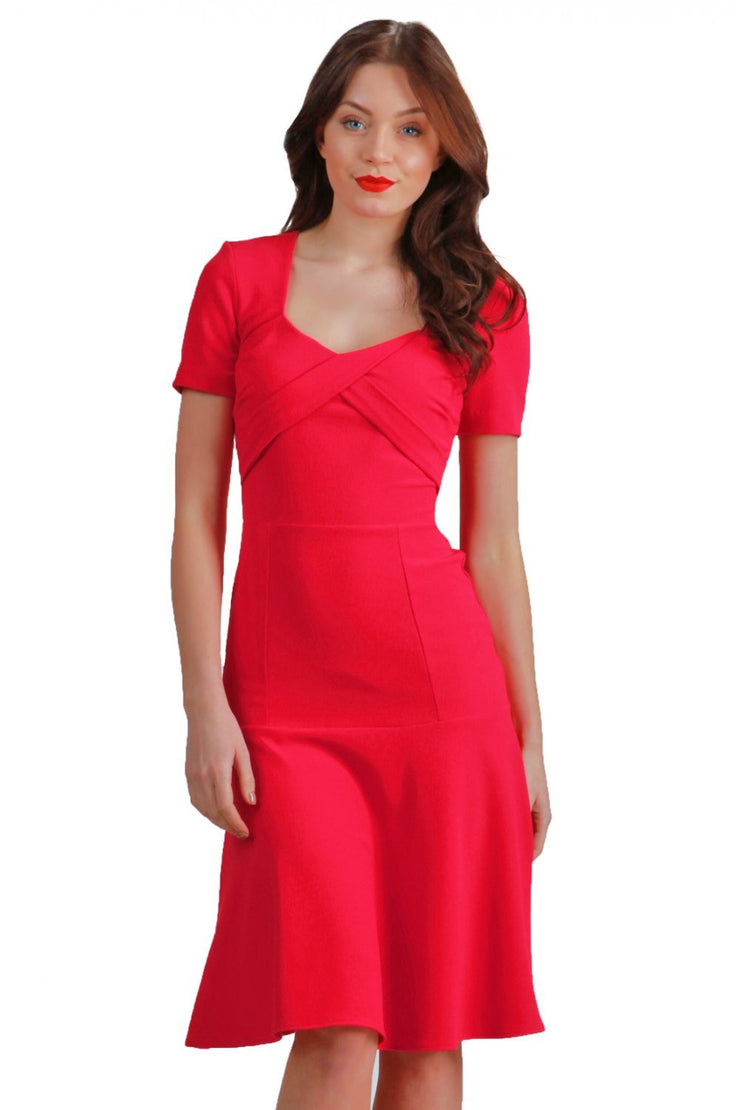 model is wearing diva catwalk madison a-line dress with square neckline and short sleeve in honeysuckle pink front