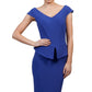 Model wearing the Diva Azalea Peplum dress with semi V neckline and peplum waistline in riviera blue front image