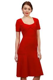 model is wearing diva catwalk madison a-line dress with square neckline and short sleeve in scarlet red front