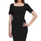 Model wearing Diva Mollie pencil dress with short sleeve in black front