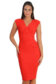 Model wearing the Diva Sylvia dress in pencil dress design in fiesta orange front image
