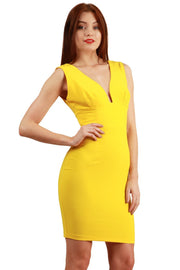 Model wearing the Diva Athens Short dress sleeveless with plunging neckline, semi square open back in empire yellow front image