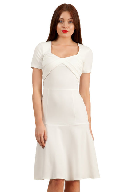 model is wearing diva catwalk madison a-line dress with square neckline and short sleeve in ivory cream front