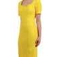 model wearing diva catwalk mitzi short sleeve pencil dress with square frilled neckline in freesia yellow front 