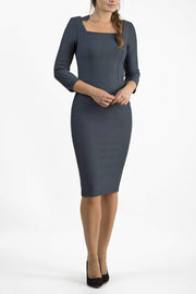 model is wearing seed rowena pencil dress with sleeves and square neckline in slate grey front