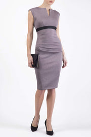 blonde model is wearing dive catwalk nadia sleeveless contrast band pencil-skirt dress with rounded neckline with a slit in the middle in pink front