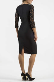Brunetter Model is wearing seed couture lace pencil dress by diva catwalk in black back