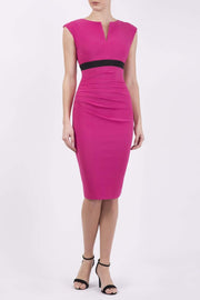 brunette model wearing diva catwalk nadia sleeveless pencil dress in pink colour with a contrasting black band and exposed zip at the back with a rounded neckline with a slit  in the middle front