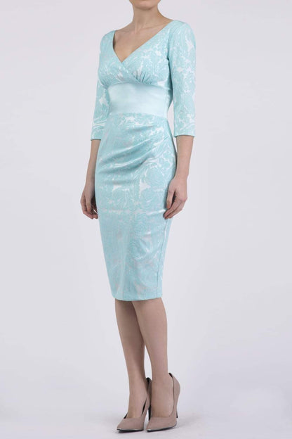 Model wearing the Diva Stamford Satin dress in pencil dress design in turquoise front image