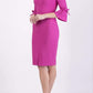 blonde model wearing diva catwalk zoe 3 4 sleeve formal dress with a split rounded neckline and split on skirt in pink colour front