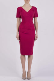 Model wearing the Diva Opal dress in pencil dress design in dazzle pink front image