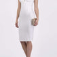 Model wearing the Diva Athens lace pencil dress with gathered lace trim around high neck and shoulder edges in ivory cream front image  