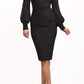 brunette model wearing diva catwalk black pencil dress with long sleeves knee length and mesh detail sleeves front