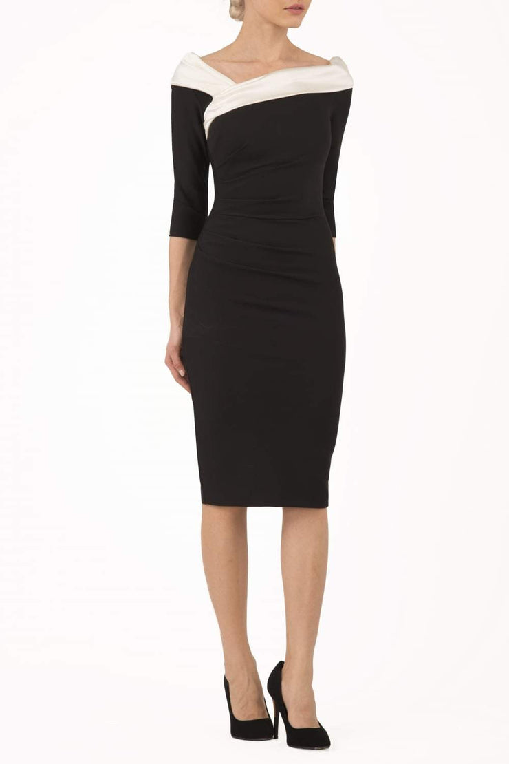 model is wearing diva catwalk pencil dress with contrasting asymmetric satin neckline in black front