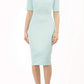 model is wearing diva catwalk solway pencil dress cold shoulder detail and rounded neckline in mint green front