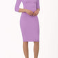 model wearing diva catwalk york pencil-skirt dress with sleeves and rounded folded collar and plearing across the tummy area in violet bloom colour front