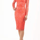 Model wearing a diva catwalk Montana Lace Dress with long lace sleeve and knee length with round lace neckline in Hot Coral colour front